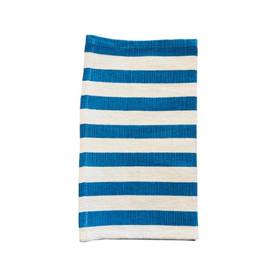 Natural and teal striped dish towel half folded