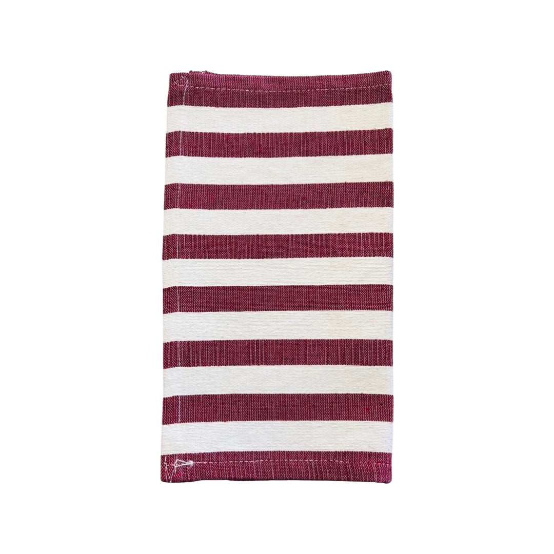 Natural and burgundy striped dish towel half folded