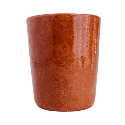 front view of red clay shot glass with glossy finish