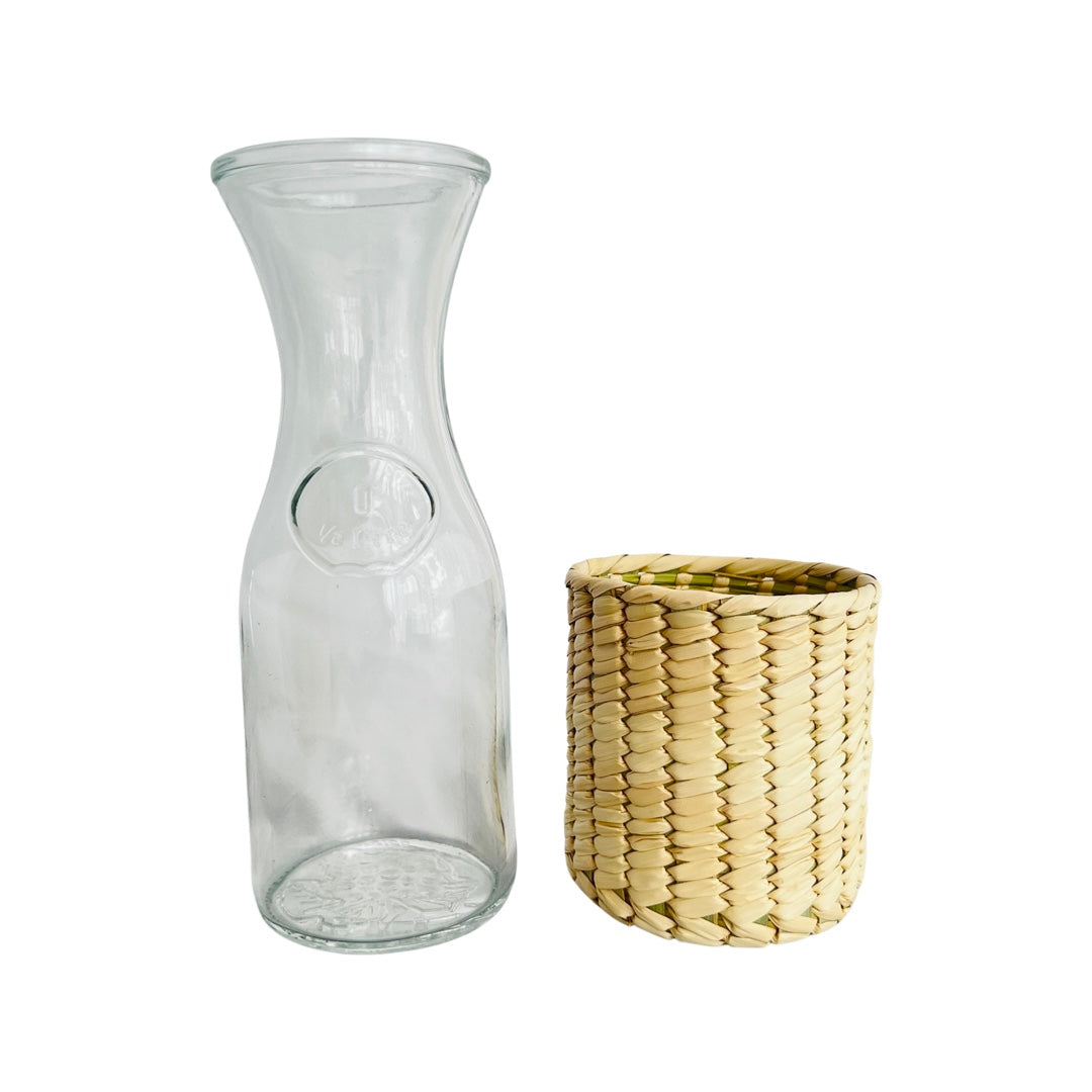 1 Liter Glass carafe with a natural palm cover at its side