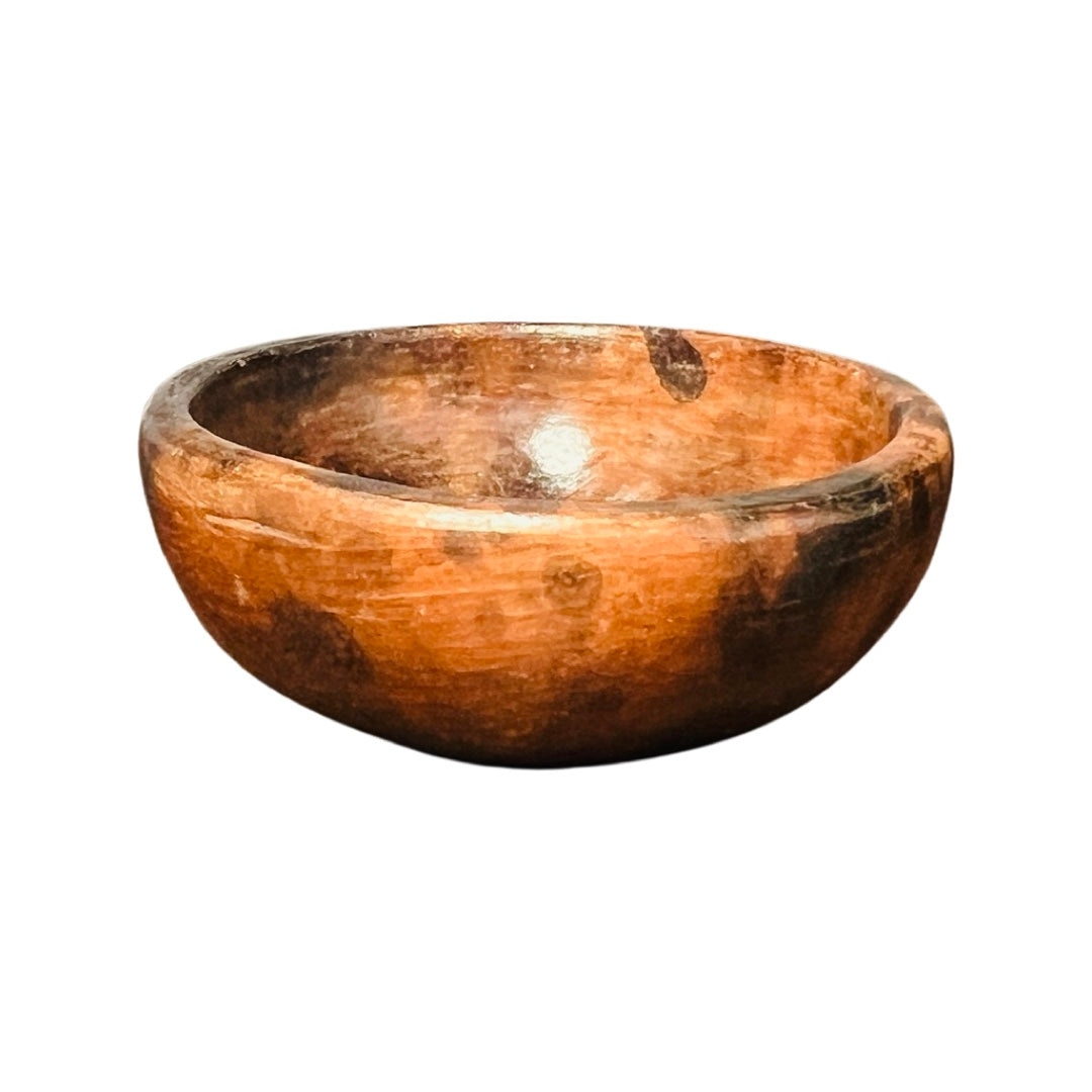 Small red and black clay mezcal cup.