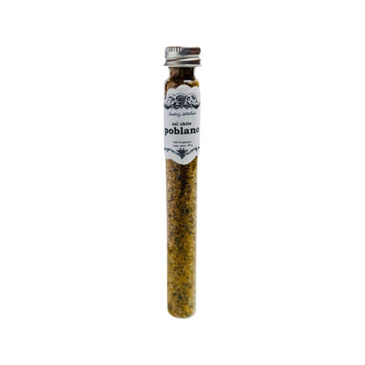 front view of Sal de Chile Poblano in clear glass branded tube with silver lid
