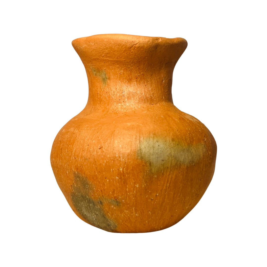 Front view of a barro rojo, red clay, mini pitcher