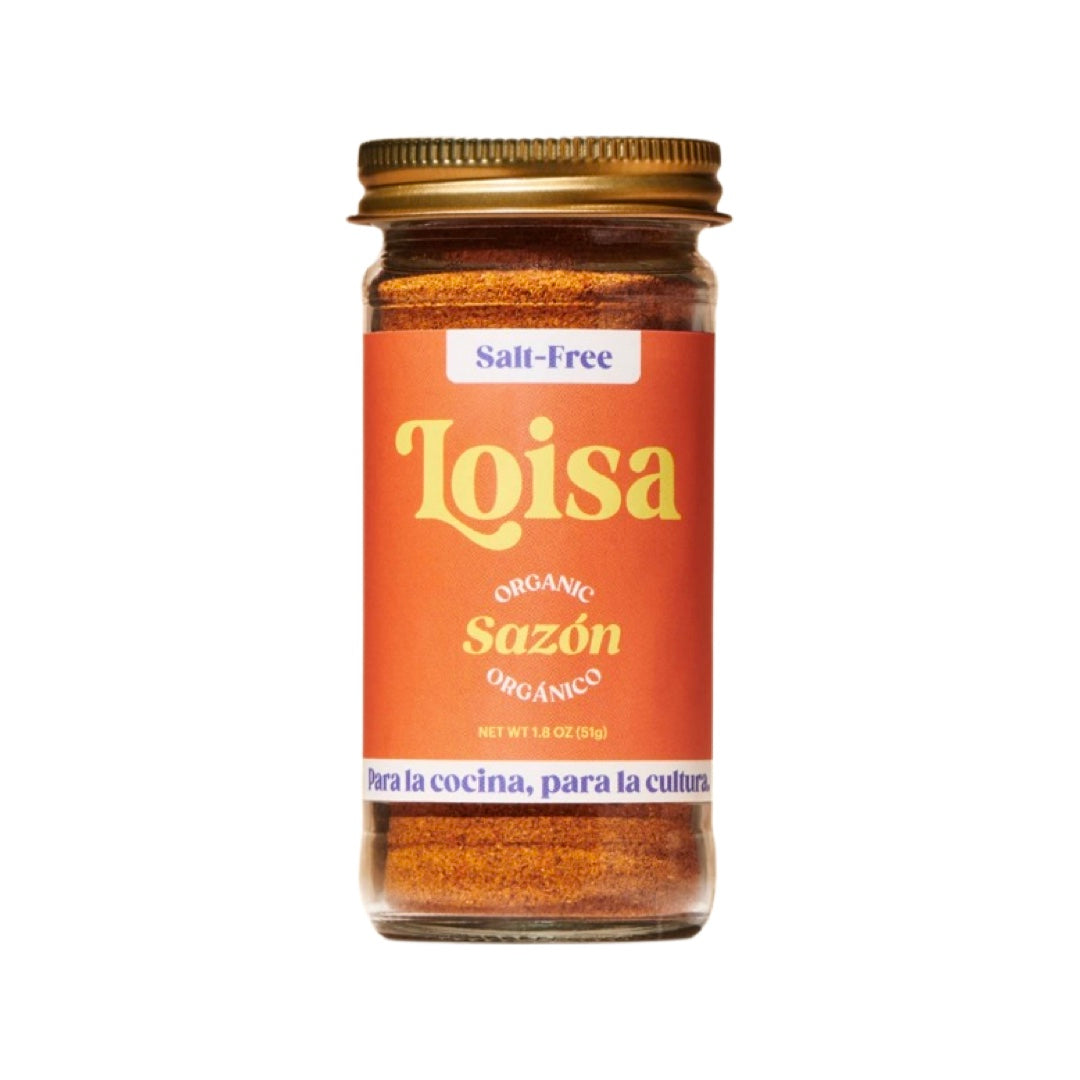 1.8 oz clear jar of salt-free sazon seasoning with an orange brand label