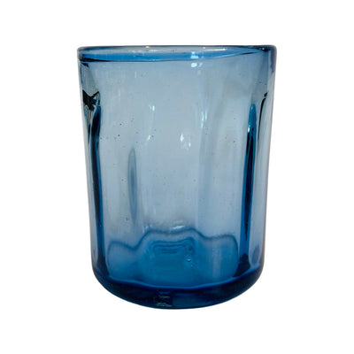 Single blue glass with a scalloped design