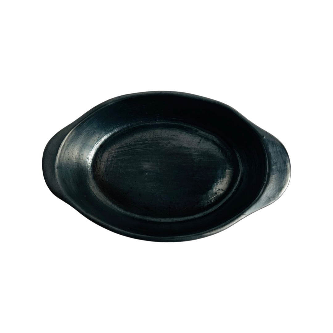 Top view of a barro negro, black clay, cazuela (casserole dish).