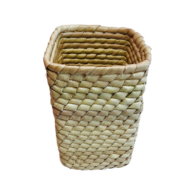 Top view of a woven palm leaf rectangular basket