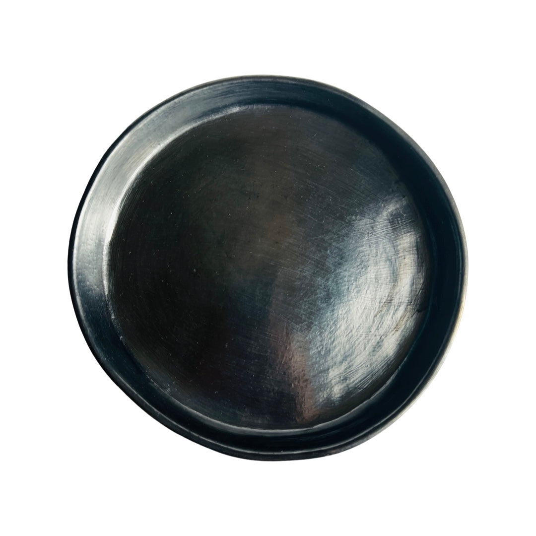 Top view of a barro negro, black clay, plate